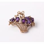 A 9 ct gold and amethyst 'basket' of flowers brooch, approx 11 g