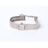 A Jean Renet, a ladies 9 ct white gold bracelet watch, circa 1968, a square silver dial with