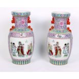 A pair of Chinese baluster vases with panels of figures, 61cm high (2)