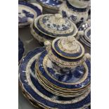 A Booths 'Real Old Willow' pattern dinner service together with a matching part tea service (qty)