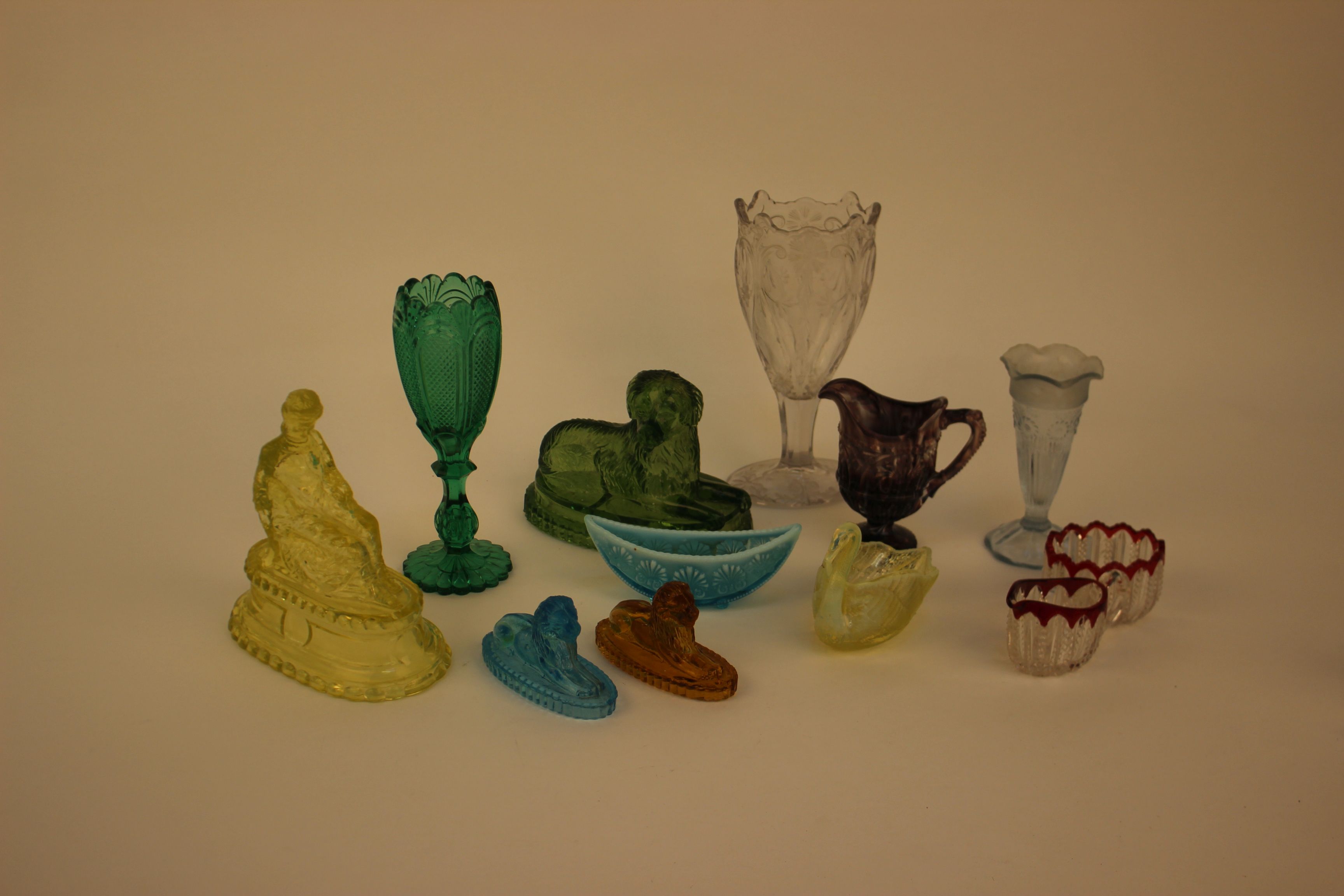 Pressed glassware to include coloured and other, vases, dishes and decanters