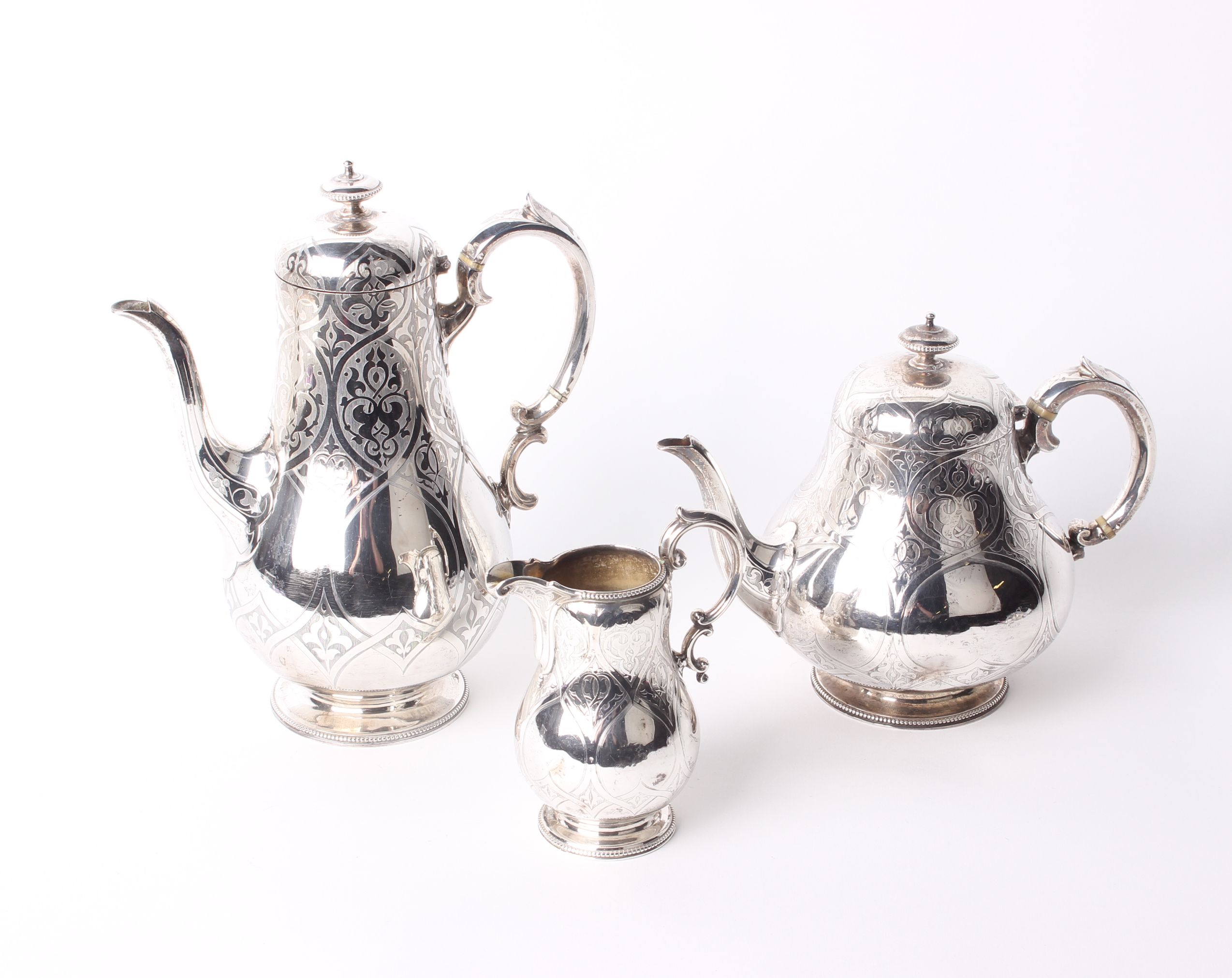 A Victorian silver three part service Edward & John Barnard, London each with engraved decoration,