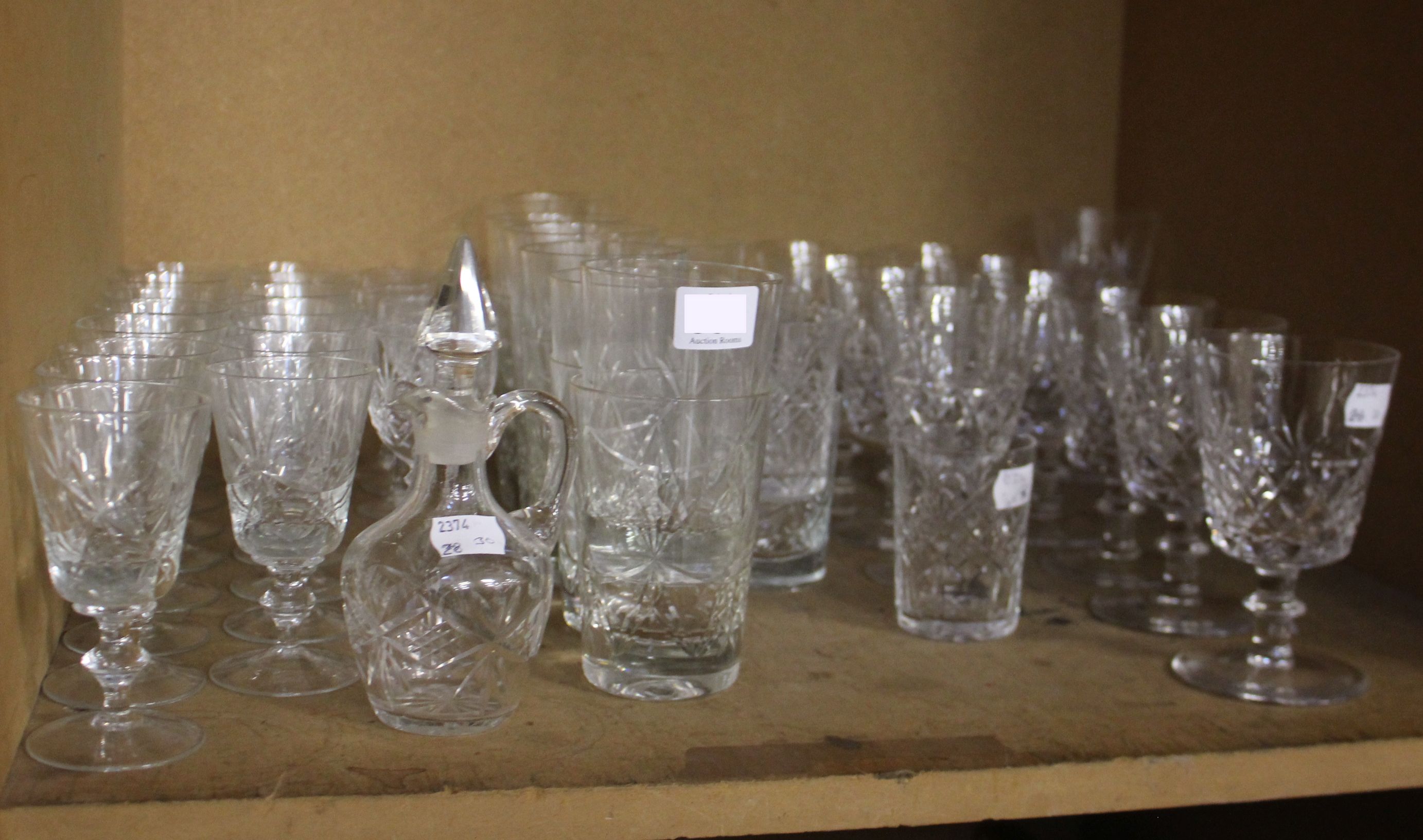 Glassware; A suite cut glass tableware, fan design, 56-pieces