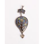 An Arts and Crafts enamelled pendant, the central Boteh-Shaped panel depicting a stylised tree on