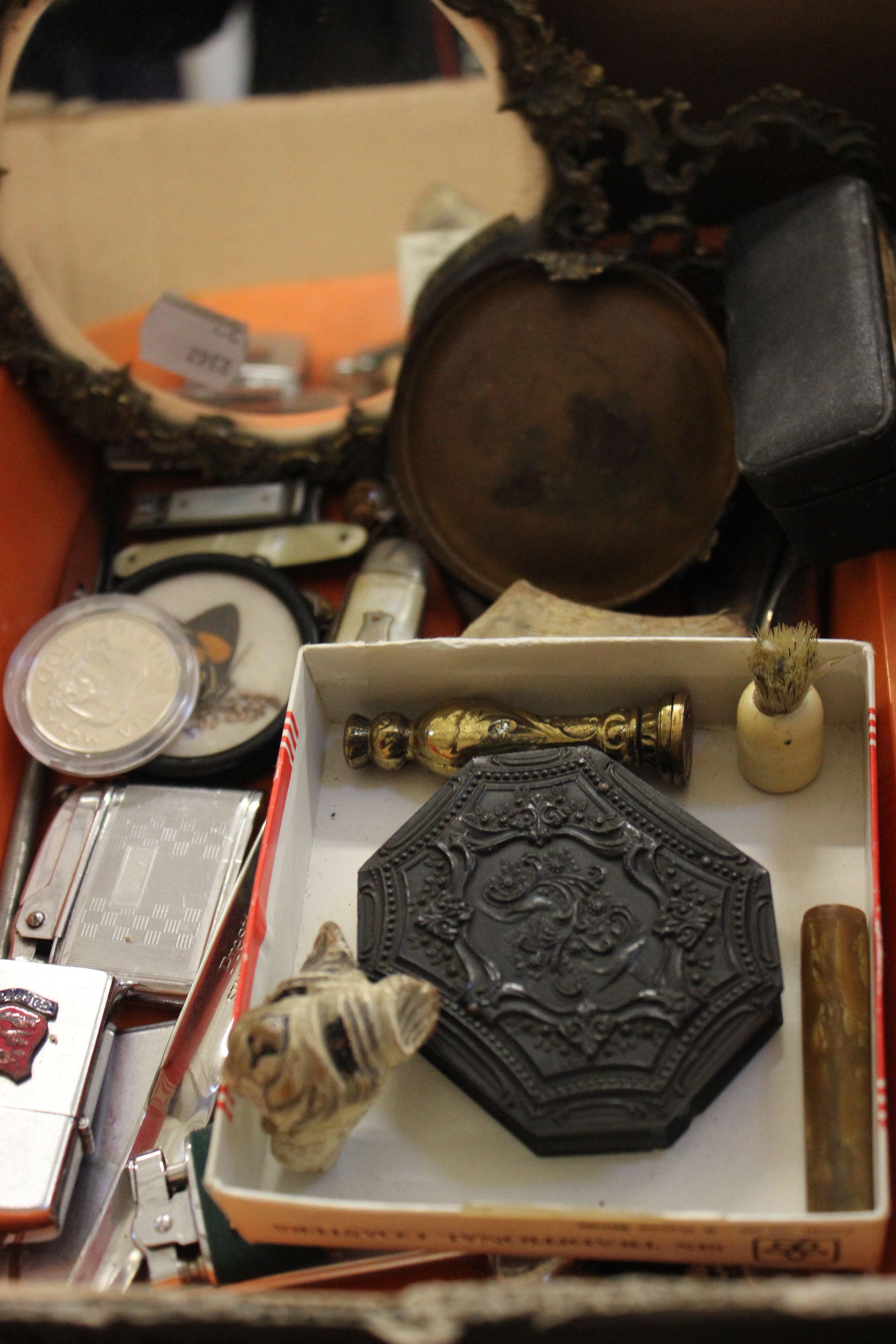 An interesting assortment of miscellanea including a Smiths interval timer, an ornate hand mirror, a