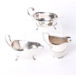 A silver sauce boat John Turton & Co, Sheffield, 1934, together with two further silver