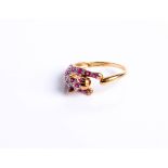 A 9ct gold ruby and diamond Panther ring, post 2000 marks, size P, 3g gross