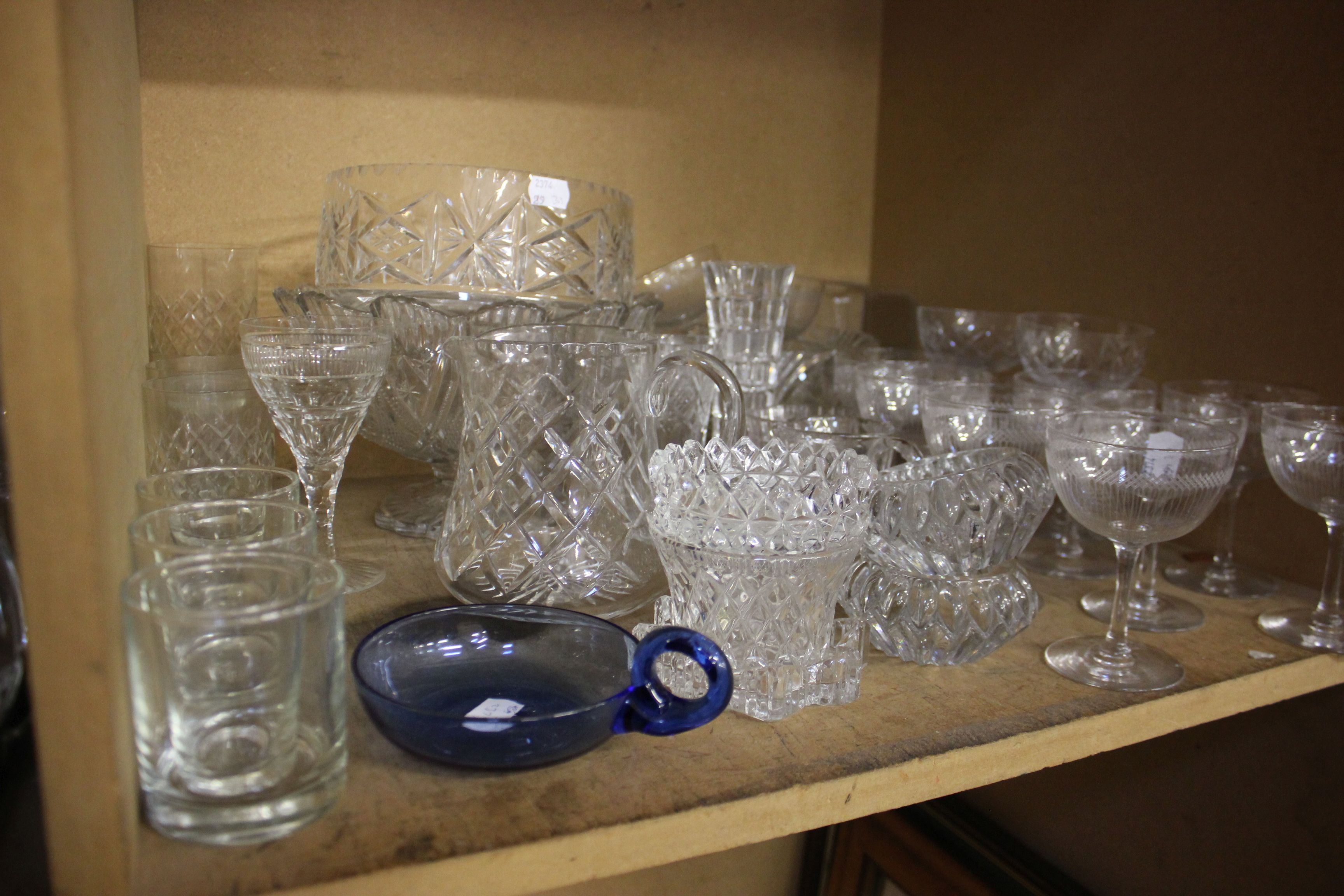 Glassware; table glass to include, champagne glasses, jugs, fruit bowls etc, two shelves - Image 2 of 2