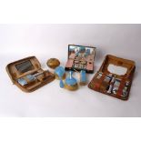 An Edwardian silver mounted heart dressing set, two enamelled silver hair brushes, a dressing case