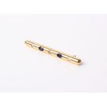 An 18 ct gold, sapphire and diamond five stone bar brooch the three round brilliant diamonds approx.