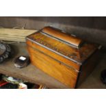 A 19th Century walnut and featherbanded tea caddy, weights and a Tibetan bound scroll