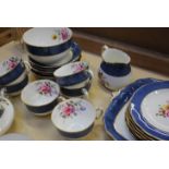 Tea sets: A six place setting set of Royal Crown Derby blue band and floral decoration and a