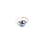 A Continental black south sea/Tahitian cultured pearl ring, the cultured pearl approx 9 mm