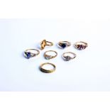 Seven various gold and gem set dress rings in various designs including amethyst, citrine and