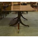 A Whittock and Reid Mahogany twin pedestal Mahogany dining table