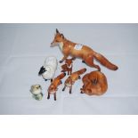 Collection of Beswick Ware, including 5 foxes, a gold-crest and a sheep