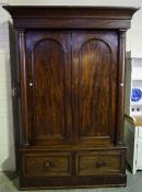 Victorian 2 door mahogany wardrobe with turned columns, fitted interior and 2 drawers to base