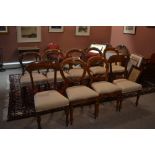 A harlequin set of 10 Victorian mahogany chairs with drop in linen covered seats