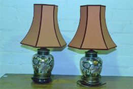 A pair of oriental porcelain lamps