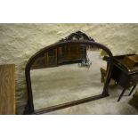 Victorian style mahogany stained over mantle mirror.