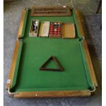 A 'Riley' table top, quarter size snooker table, with cues, score board and balls