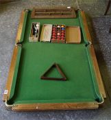 A 'Riley' table top, quarter size snooker table, with cues, score board and balls
