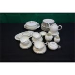 An 8 piece dinner service including coffee cups etc. 52 pieces all together