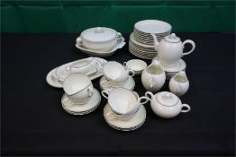 An 8 piece dinner service including coffee cups etc. 52 pieces all together