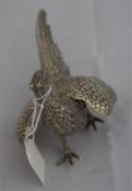 1 silver pheasant table decoration weighing 4.98 ounces