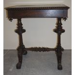 A Victorian rose wood, work/sewing table on turned pillars with cabroile legs