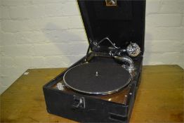 His masters voice portable gramophone player, records, needles and needle trimmer