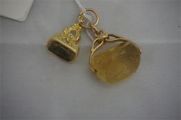 2 19th century yellow metal, gem set watch fobs with crested seals
