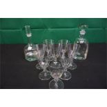 A set of 8 knopped Stemmed engraved glasses & 2 decanters