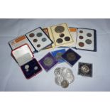 A collection of commemorative coins including 8 crowns, Kennedy dollar, Maundy money and first decim