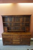 Georgian oak dresser with plate rack above, 6 drawers to base with swan necked brass pulls, plus 2 c