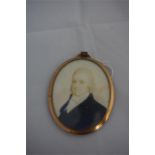 Portrait of a gentleman in early 19th century dress, in gold frame