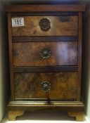 A walnut, 3 drawer miniature chest
