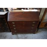 A georgian inlaid mahogany, fall front bureau with fitted interior, 4 graduated drawers and brass pu