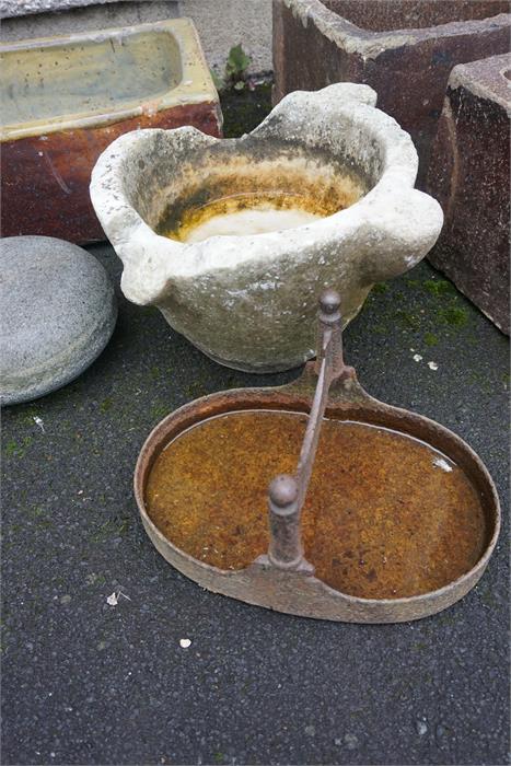 A Victorian cast iron boot scraper and a marble morter.