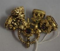 4 19th century yellow metal with raised decoration watch fobs with mounted gem set seals and a 19th