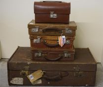 3 Leather attached cases,1 leather sandwich case and 1920's leather and canvas officers suitcase wit
