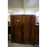 Mahogany serpentine fronted 3 door fitted wardrobe, a matching gents dresser and dressing table