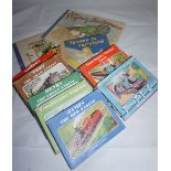 8 volumes of 'Thomas the tank Engine' and 2 other children books including 'flying Scotsma' and 'puf