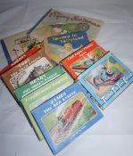 8 volumes of 'Thomas the tank Engine' and 2 other children books including 'flying Scotsma' and 'puf