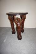 Carved African figure lamp table