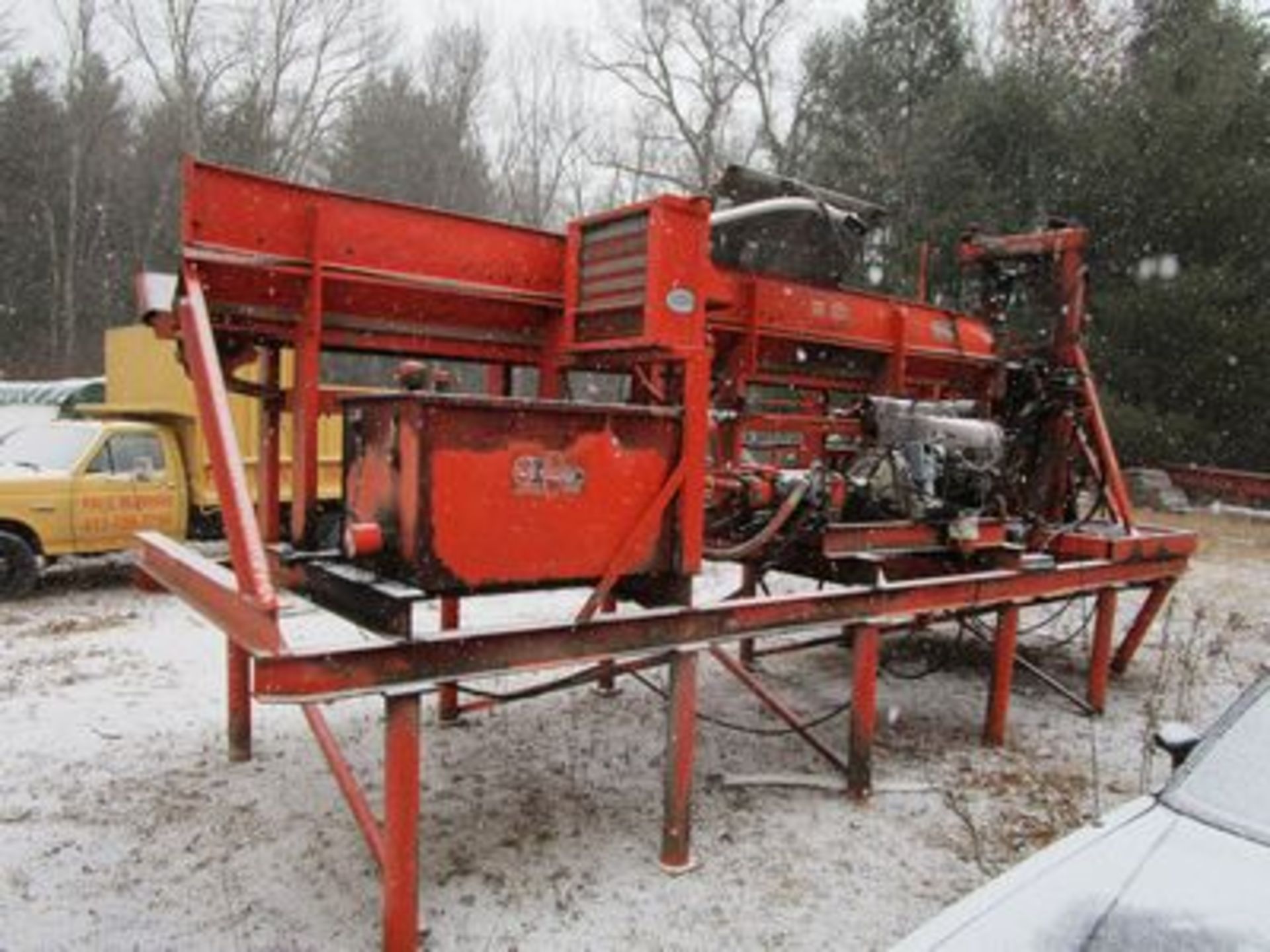 CMC FIRE WOOD PROCESSOR: 20' X 12" INFEED MOTORIZED CHAIN CONVEYOR, 4' CHAINSAW, 4' ADJ. LOG