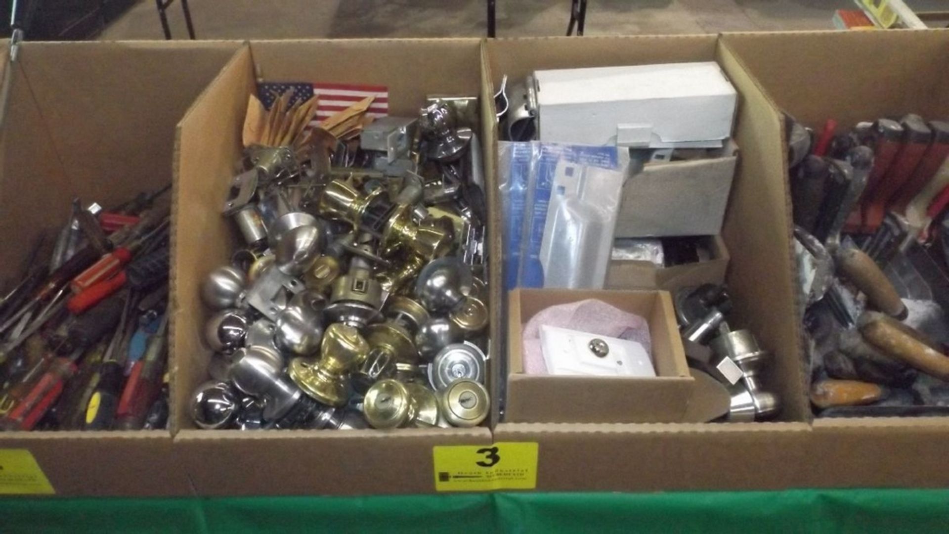 BOXES OF DOOR KNOBS AND ENTRY WAY HARDWARE