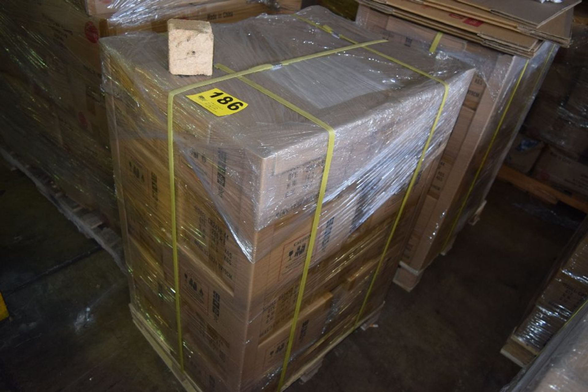 BOXES OF CR2450-44 BATTERIES ON SIX SKIDS