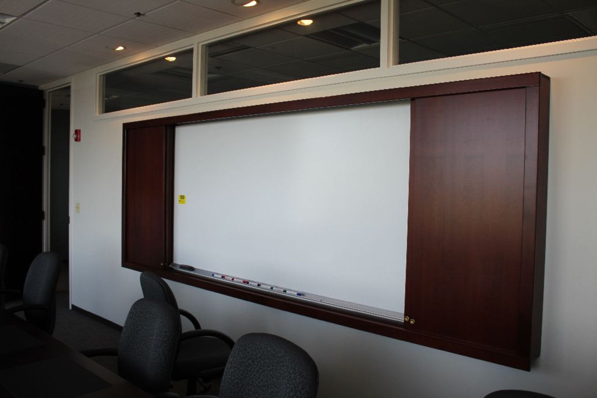 LARGE WALL MOUNTED WHITE BOARD CABINET, WHITE BOARD IS 96" X 48", OVERALL CABINET IS 148" X 53"