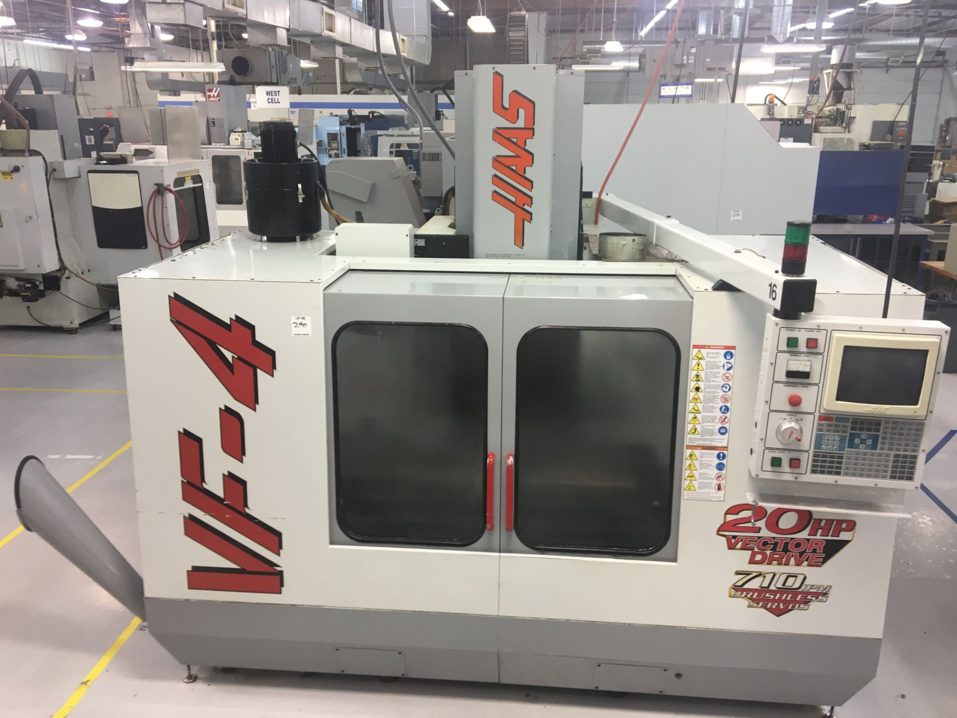 1997 HAAS VF-4 CNC VERTICAL MACHINING CENTER- 20HP, P-COOL, ROYAL MIST, CHIP AUGER, 20 UMBRELLA, S/